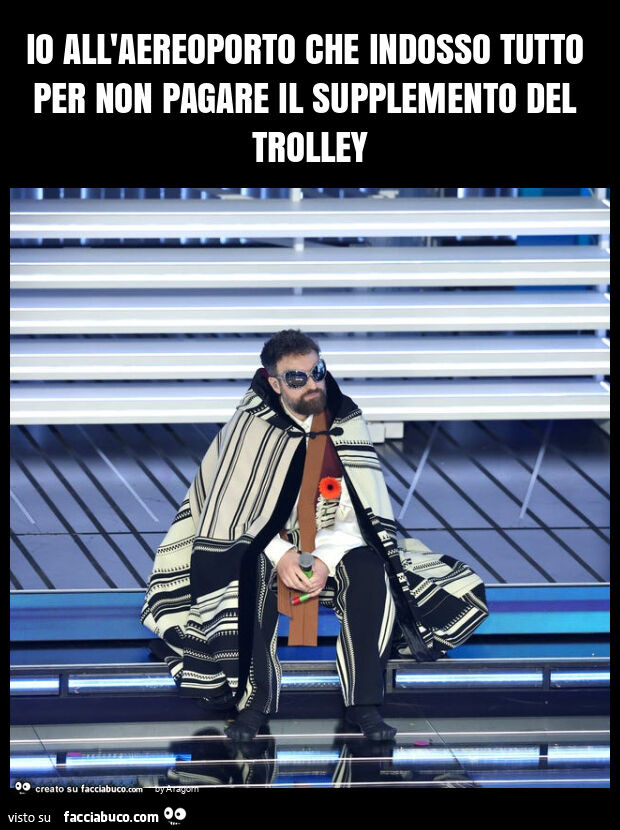 Io all'aereoporto che indosso tutto per non pagare il supplemento del trolley
